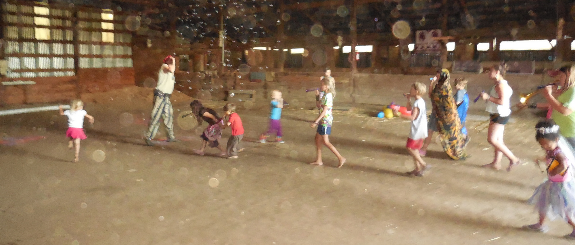 Children playing in barn.
